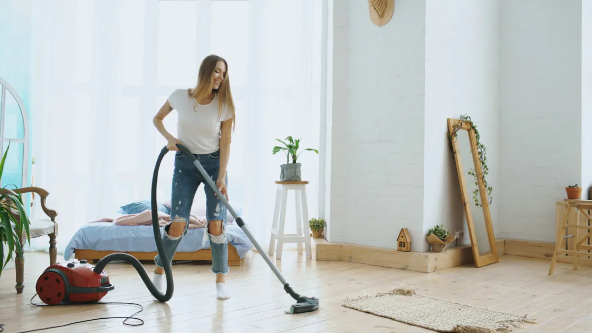 Bright living space being vacuumed after a central vacuum service