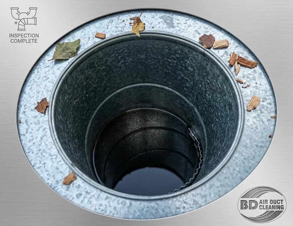 Air duct inspection showing debris around the duct opening
